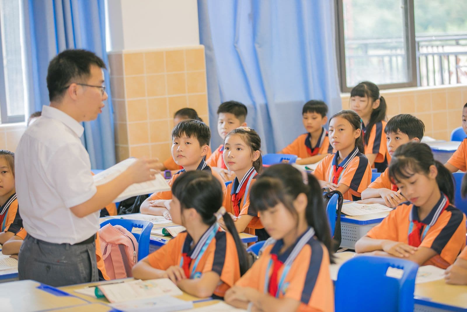 Teacher and students in a classroom