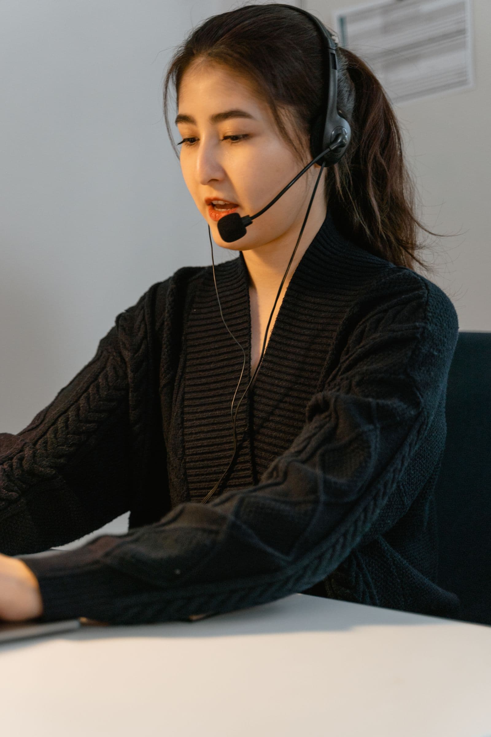 Customer support professional using a headset