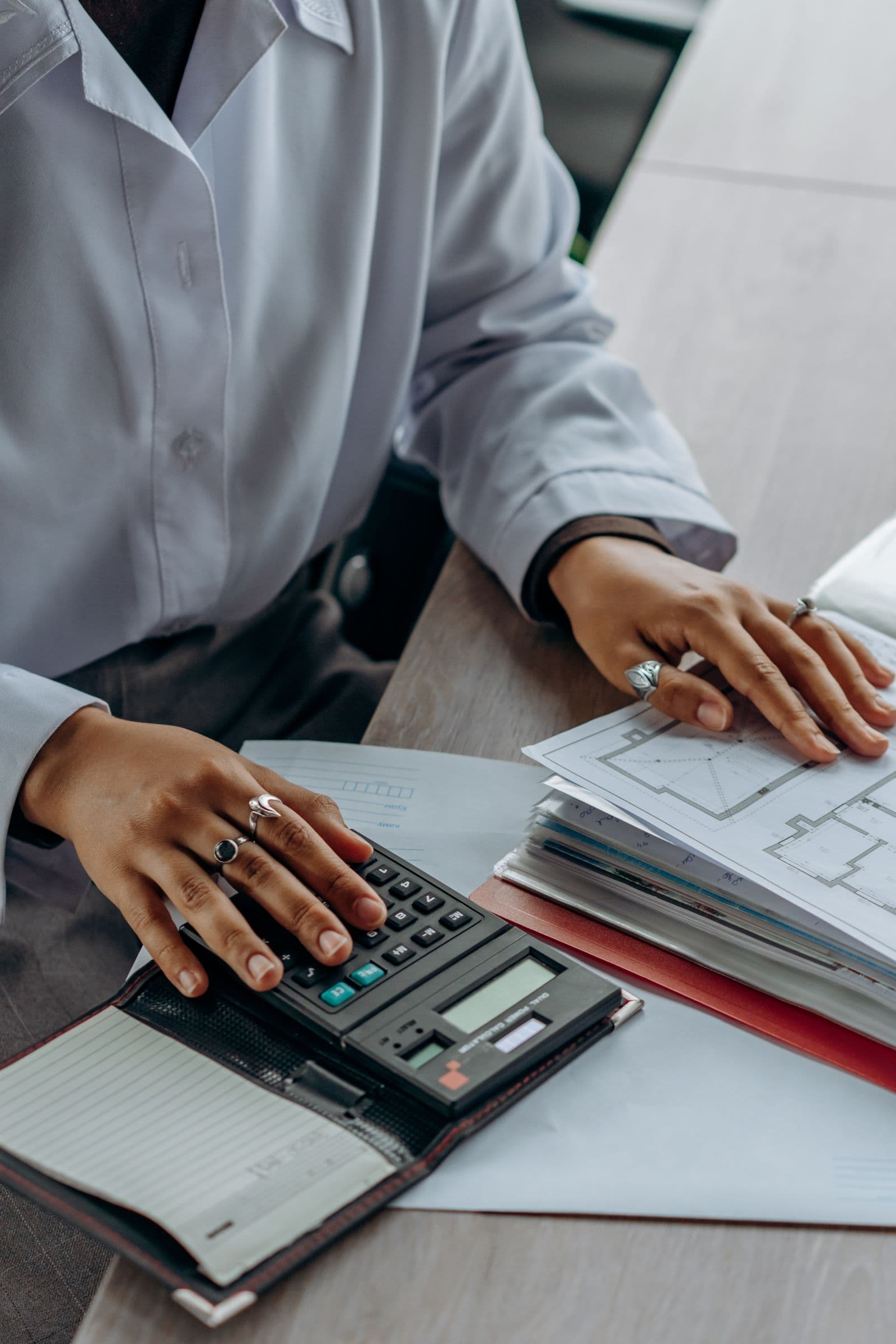 Working with a calculator and business documents